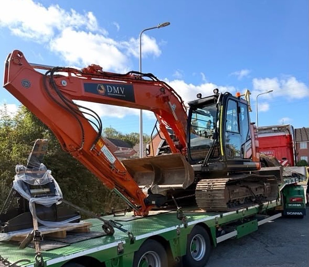 DMV Groundworks 13 tonne Hitachi excavator on a low loader